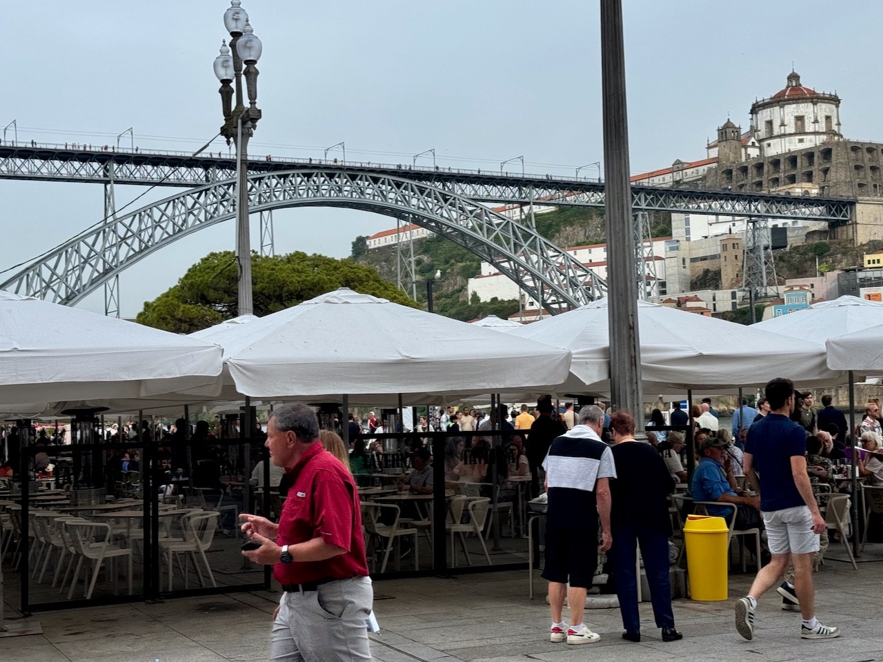 People and restaurants on Praça da Ribiera, Porto. Photo by ConsumerMojo.com 