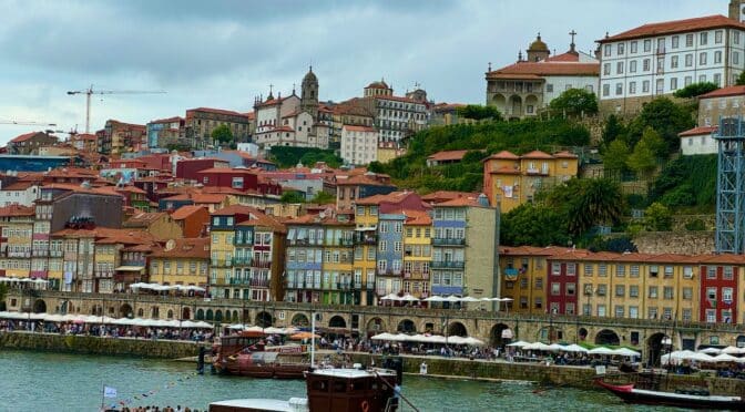 Rabelo with tourists on the Douro in Porto. One of the many rabelos we saw during our three days in Porto and the Douro Valley. Photo by ConusmerMojo.com