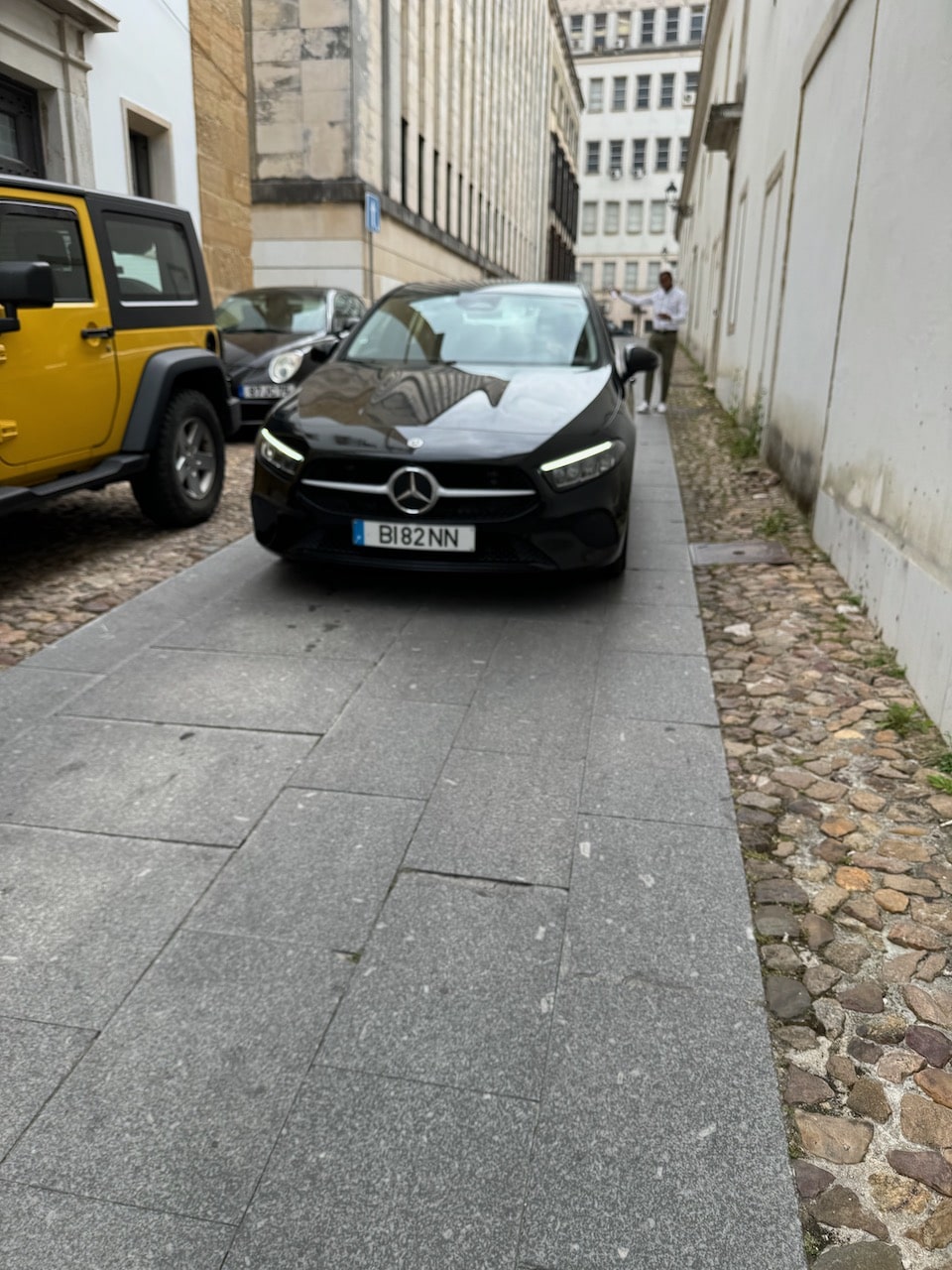 Parking the car in alley street in Coimbra. Photo by ConsumerMojo.com