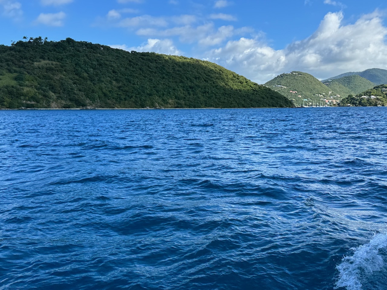 View from a sailing boat moving through the Narrows from St. John to the British Virgin Islands. Photo by ConsumerMojo.com