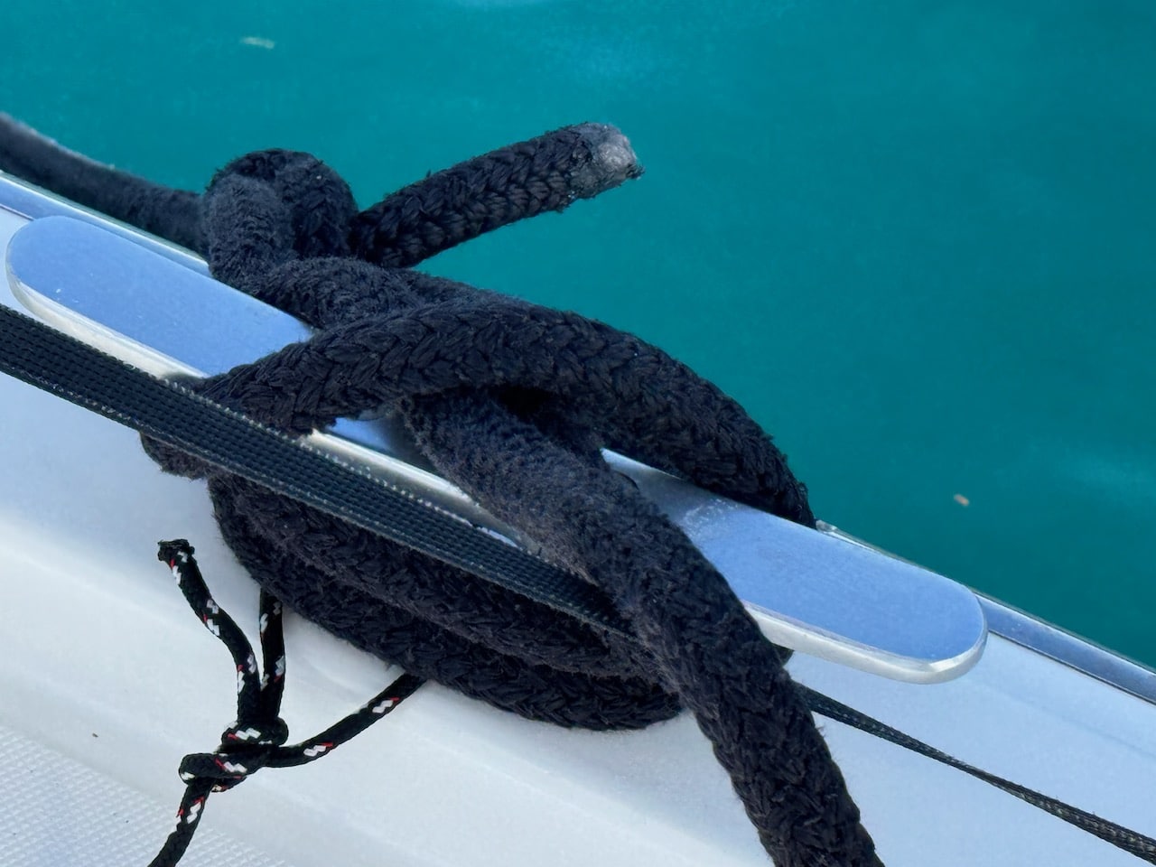 Mooring line attached to a cleat.